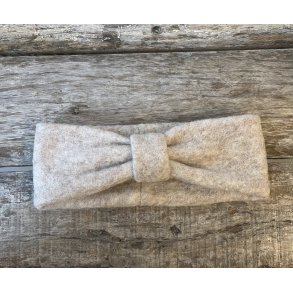 Creme pandeb�nd med rynk.